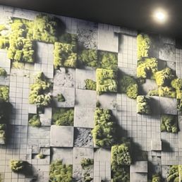 AI-generated wall art of moss and tiles. There are various wavy lines and inconsistent strokes.