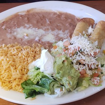 La Herradura - Shredded Beef taquitos with a side of beans and rice - Mexican Near Me - Tucson, Arizona La Herradura - Shredded Beef taquitos with a side of beans and rice - Mexican Near Me - Tucson, Arizona