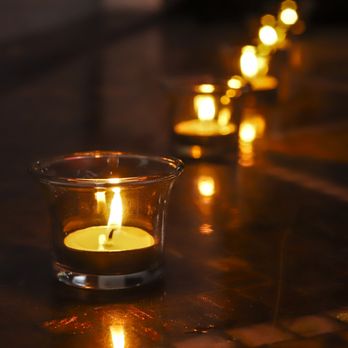 Divino Pecado & Santo Bocado - a row of lit candles - Dance Clubs Near Me - Doral, Florida Divino Pecado & Santo Bocado - a row of lit candles - Dance Clubs Near Me - Doral, Florida