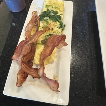 Keke's Breakfast Cafe - Bacon and a mini omelette with spinach, onion, green peppers and pepper jack cheese - Cafes Near Me - Wellington, Florida Keke's Breakfast Cafe - Bacon and a mini omelette with spinach, onion, green peppers and pepper jack cheese - Cafes Near Me - Wellington, Florida