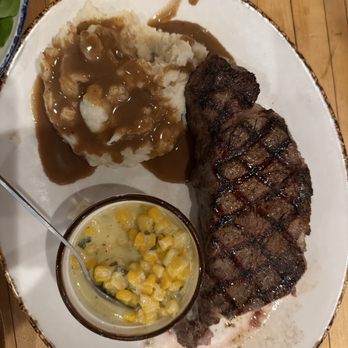 The Bears Den Steakhouse - New York strip with mashed potatoes and corn - Steakhouses Near Me - Cambridge, Ohio