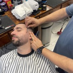 Eddy's Barber Shop - Eddy shaves and trim
