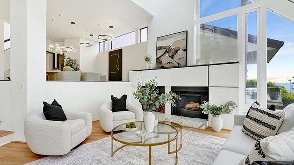 741 Marlin Dr, Laguna Beach, CA 92651 - This living room was designed to embrace clean lines and a calming coastal palette. Crisp white walls are paired with soft neutrals, layered textures, and sleek furnishings that create a sense of openness and sophistication. Floor-to-ceiling windows flood the space with natural light, while curated décor pieces add warmth without overwhelming the modern aesthetic. The result is a balanced, airy environment that feels both stylish and inviting—perfect for capturing the relaxed luxury of Laguna Beach living. 741 Marlin Dr, Laguna Beach, CA 92651 - This living room was designed to embrace clean lines and a calming coastal palette. Crisp white walls are paired with soft neutrals, layered textures, and sleek furnishings that create a sense of openness and sophistication. Floor-to-ceiling windows flood the space with natural light, while curated décor pieces add warmth without overwhelming the modern aesthetic. The result is a balanced, airy environment that feels both stylish and inviting—perfect for capturing the relaxed luxury of Laguna Beach living.