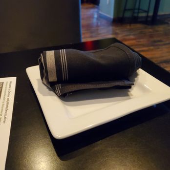 Divvy - Black napkins and a plate to put your portions on - New American Near Me - Carmel, Indiana