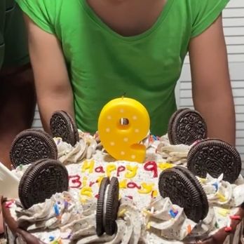 Ooh La La Bakery - Happy child with her only wish of an Oreo cake to celebrate her 9th birthday. - Bakeries Near Me - Silver Spring, Maryland Ooh La La Bakery - Happy child with her only wish of an Oreo cake to celebrate her 9th birthday. - Bakeries Near Me - Silver Spring, Maryland