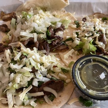 Tequila's Town - Taco Truck - steak tacos on flour tortilla, added cheese and lettuce. - Mexican Near Me - Savannah, Georgia