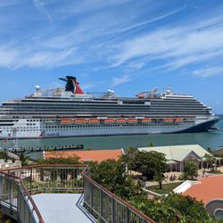 Toni Anderson Enterprises - Carnival Cruise Ship at the beautiful Amber Cove port of call
