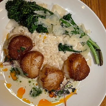 1010 Bridge Restaurant - Pan Seared Day Boat Scallops Herb Scented Parmesan Risotto, Charred Broccolini Preserved Ramp Butter & Calabrian Chili Oil - New American Near Me - Charleston, West Virginia 1010 Bridge Restaurant - Pan Seared Day Boat Scallops Herb Scented Parmesan Risotto, Charred Broccolini Preserved Ramp Butter & Calabrian Chili Oil - New American Near Me - Charleston, West Virginia