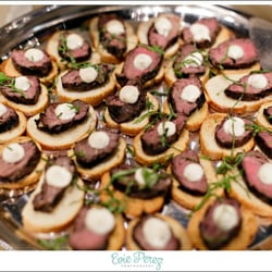 Carriage House Catering Inc - Beef Tenderloin Bruschetta topped with Creamy Horseradish Sauce