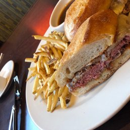 a sandwich and french fries on a plate
