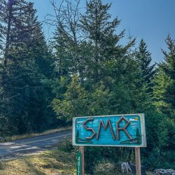 Serenity Mountain Retreat - Sign near the road.