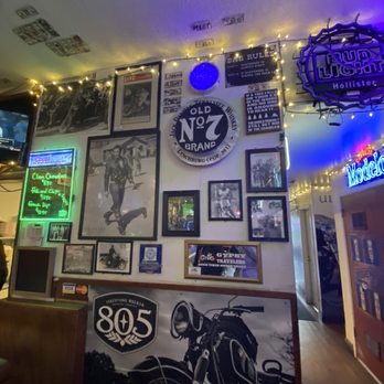 Johnny's Bar & Grill - a wall full of memorabilia - Karaoke Near Me - Hollister, California Johnny's Bar & Grill - a wall full of memorabilia - Karaoke Near Me - Hollister, California