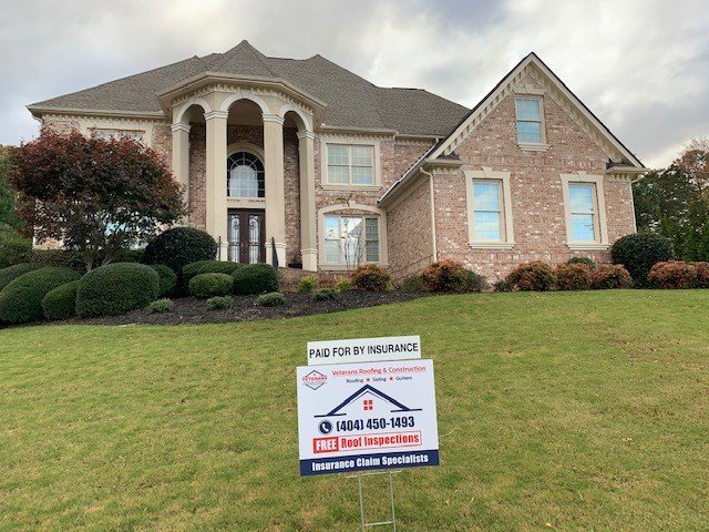 Slide of Veteran's Roofing Company