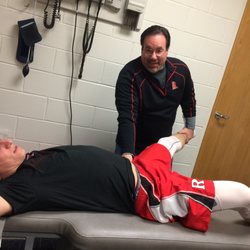 Haley Chiropractic - Dr. Haley does soft tissue therapy on a lacrosse athlete.