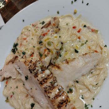 Sal Y Pimienta Kitchen - Pasta and chicken cream dish with angel hair - Latin American Near Me - Houston, Texas