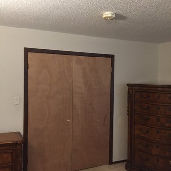 Crusader Construction - a bedroom with a closet and dresser - General Contractors Near Me - Plattsmouth, Nebraska