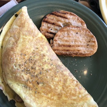 Jungle's Cafe - Omelette with toast. I got sausage and peppers and onions. - Coffee & Tea Near Me - Trujillo Alto, Puerto Rico Jungle's Cafe - Omelette with toast. I got sausage and peppers and onions. - Coffee & Tea Near Me - Trujillo Alto, Puerto Rico