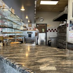 Milano Pizza - Pretty solid pizza joint located in an almost hidden shopping center. Plenty of parking, foods good and the prices are fair.