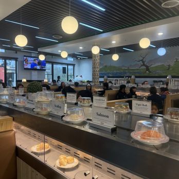 Sushi Zone - A view of the conveyer belt from my table - Conveyor Belt Sushi Near Me - Bothell, Washington