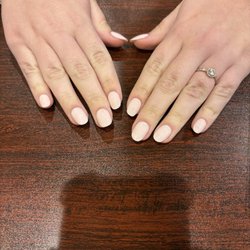Perfect Nails - Younger guy gave me an attitude while slamming stuff on table. paints over the polish that was on my hands. Nails are awful.