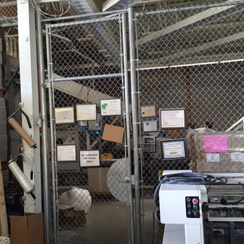 Shred Defense - Behind Gates: Conveyor System where the employee dumps your paper docs to shred - Shredding Services Near Me - Richmond, California Shred Defense - Behind Gates: Conveyor System where the employee dumps your paper docs to shred - Shredding Services Near Me - Richmond, California