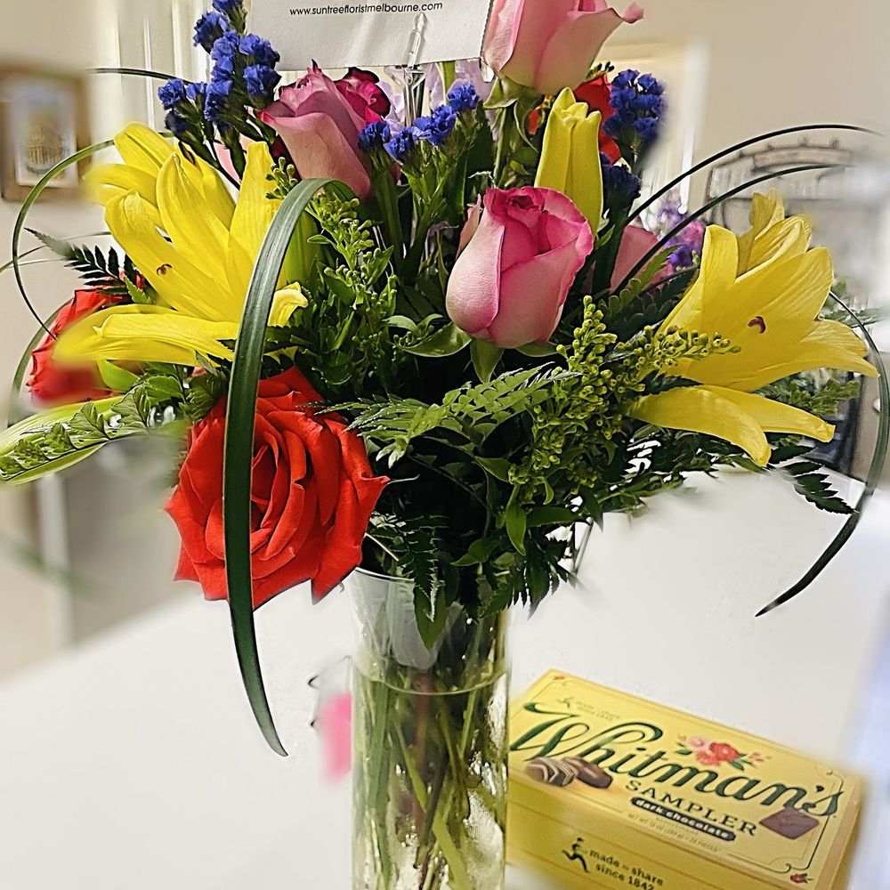 Floral arrangement with chocolate Floral arrangement with chocolate