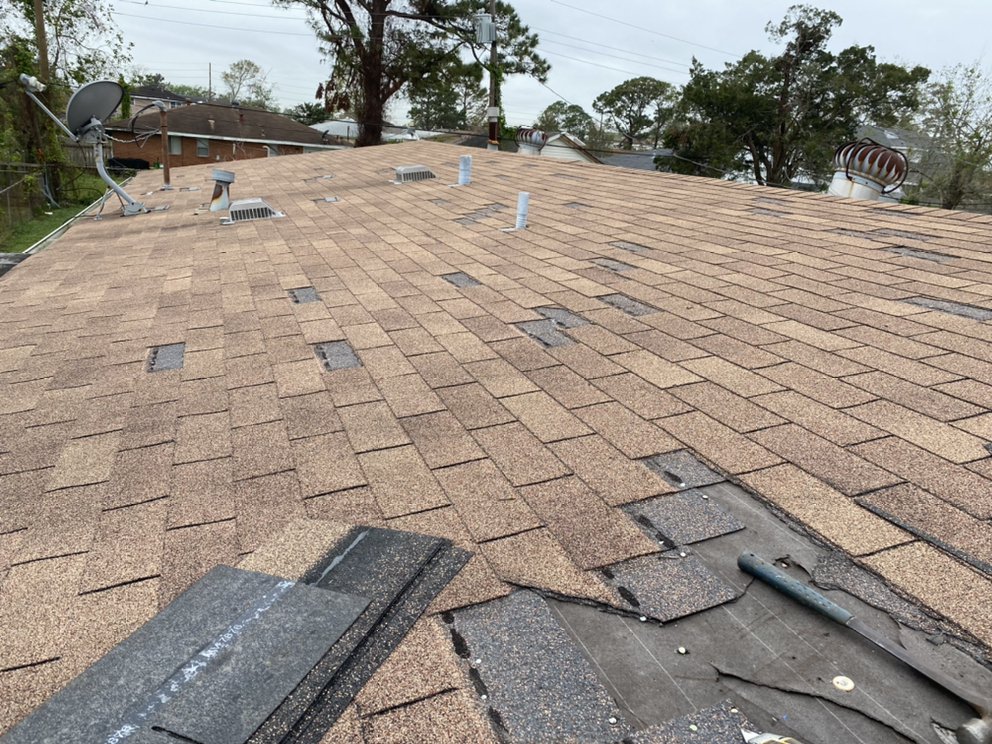 Slide of Roof repair & leak experts - NOLA