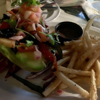 Taqueria Vatos Locos - Half Avocado Stuffed with veggies and fries (Vegan) non vegan would have rice (chorizo inside) and cheese and different protein - Mexican Near Me - Rincon, Puerto Rico