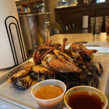 SEA Crab House - Seattle - Lobster, Shrimp, Muscles! Sauce on the left: the Cream Cajun & Right: The Sea Spicy.. - Cajun/Creole Near Me - Seattle, Washington SEA Crab House - Seattle - Lobster, Shrimp, Muscles! Sauce on the left: the Cream Cajun & Right: The Sea Spicy.. - Cajun/Creole Near Me - Seattle, Washington