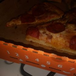 Notice the major difference in crust size? And both pieces were from the same box!!!