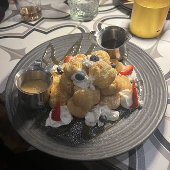 Rosalia's Kitchen - Mt Etna dessert. Tasty cream puffs! - Italian Near Me - Miramar, Florida Rosalia's Kitchen - Mt Etna dessert. Tasty cream puffs! - Italian Near Me - Miramar, Florida