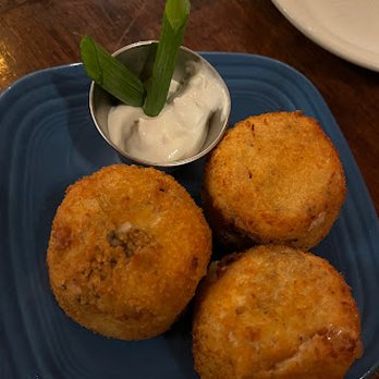 Santiago's Bodega - Croquettas:
fried potatoes, provolone, prosciutto, Cayenne pepper, scallion cream - Spanish Near Me - Altamonte Springs, Florida Santiago's Bodega - Croquettas:
fried potatoes, provolone, prosciutto, Cayenne pepper, scallion cream - Spanish Near Me - Altamonte Springs, Florida