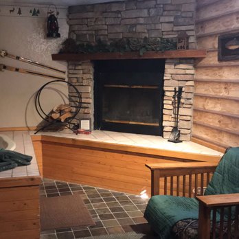 Eagle's Nest Bed & Breakfast - Mountain Spirit: fireplace, spa tub, and two chairs - Big Bear Lake, CA