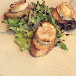 Goat cheese with honey and sesame seeds on toast