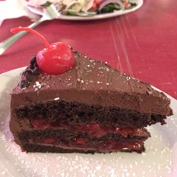 821 Café - Vegan chocolate cherry cake and a side Caesar in the back. Two very different points of view on appetizers - New American Near Me - Richmond, Virginia