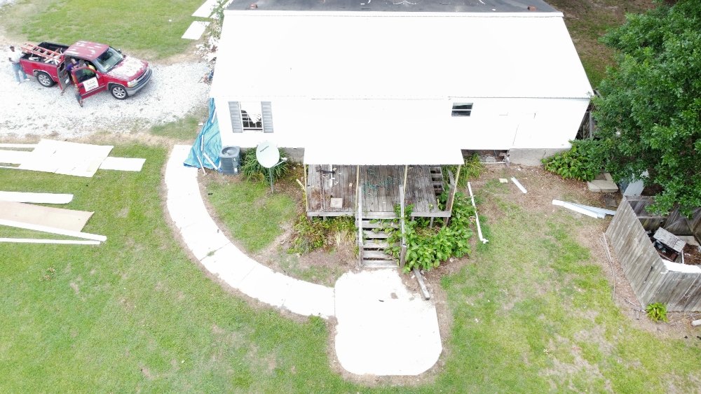 Slide of Flournoy and Sons Roofing