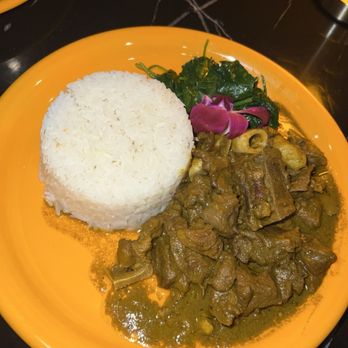 Plum Restaurant And Lounge - Yard-Style Curry Goat - New American Near Me - Brooklyn, New York Plum Restaurant And Lounge - Yard-Style Curry Goat - New American Near Me - Brooklyn, New York
