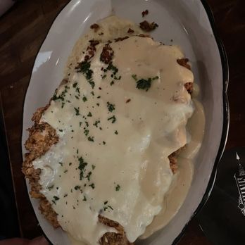 Moonshine Grill - Chicken fried steak large enough to feed the table - Southern Near Me - Austin, Texas