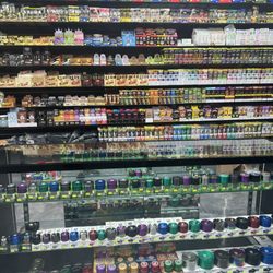 Smokey Joe Glass & Vape - Grinders and papers