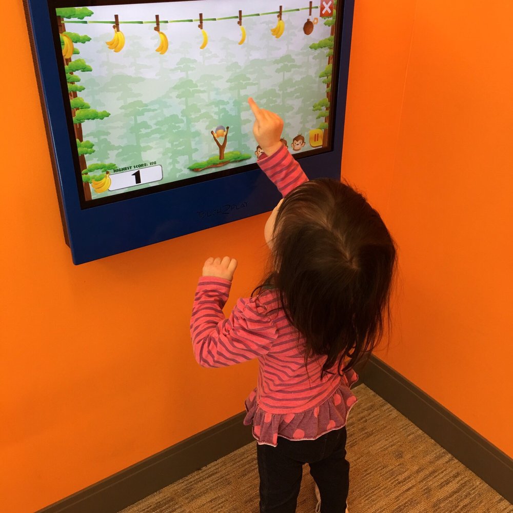 Des Moines Children's Dentistry - Waiting room tv pads - Pediatric Dentists Near Me - West Des Moines, Iowa Des Moines Children's Dentistry - Waiting room tv pads - Pediatric Dentists Near Me - West Des Moines, Iowa