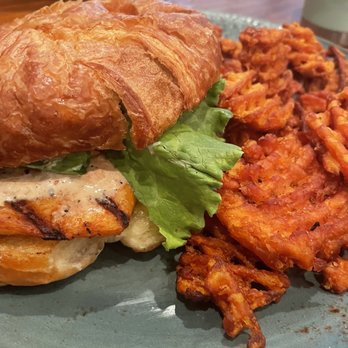 Bullfrogs Bar & Grille - salmon sandwich on croissant with sweet potato fries. it was delish! - American Near Me - Buford, Georgia Bullfrogs Bar & Grille - salmon sandwich on croissant with sweet potato fries. it was delish! - American Near Me - Buford, Georgia