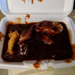 Are you kidding with this? How much effort is it to actually toss the chicken wings in the sauce? Practically inedible.  Get it together.