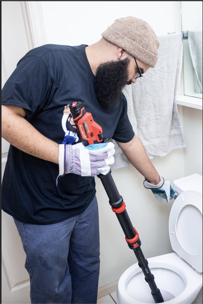 Slide of The Sewer Guys