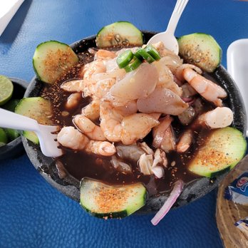 Mariscos Baja Mar - a bowl of food on a table - Seafood Near Me - Tucson, Arizona