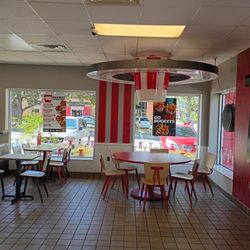 KFC - Dining area has a cool lamp that looks like a KFC chicken bucket.