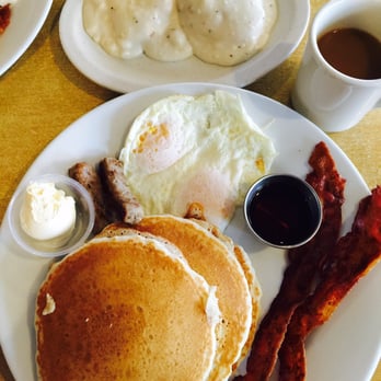 Annia's Kitchen - Stack w/ 2 bacon, 2 eggs & 2 sausages (front). Biscuits & Gravy (back) - American Near Me - El Monte, California Annia's Kitchen - Stack w/ 2 bacon, 2 eggs & 2 sausages (front). Biscuits & Gravy (back) - American Near Me - El Monte, California