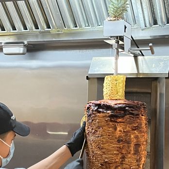 Central Taqueria - Taco pastor in "trompo" style sliced with Mexican technique by a "pastorero". The taco texture and flavor are exactly like in Mexico! - Tacos Near Me - Morristown, New Jersey