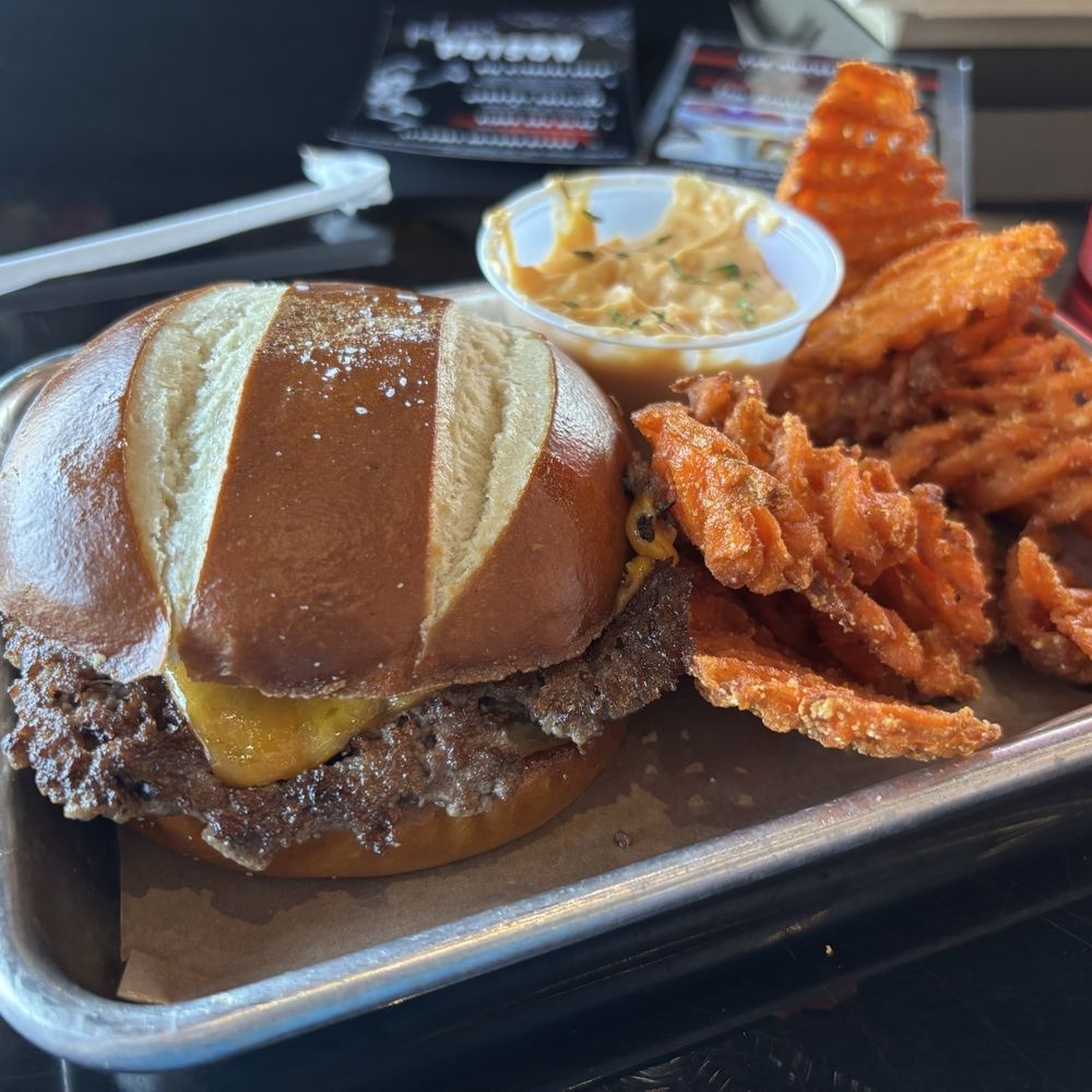 Burger Bar - October special Pretzel Burger, beer cheese, sweet potato fries - Sports Bars Near Me - Cedar Park, Texas Burger Bar - October special Pretzel Burger, beer cheese, sweet potato fries - Sports Bars Near Me - Cedar Park, Texas