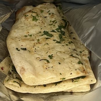 Daddy Ji Finest Indian Cuisine - Garlic naan - Indian Near Me - Claremont, California Daddy Ji Finest Indian Cuisine - Garlic naan - Indian Near Me - Claremont, California
