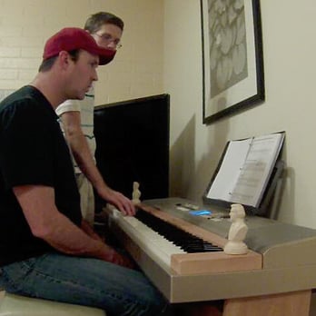 Dr Jeff Music Lessons - Teaching an adult a piano lesson - Musical Instruments & Teachers Near Me - Tempe, Arizona